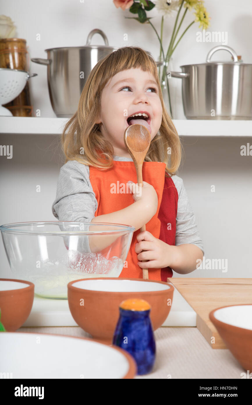 Licking the spoon hires stock photography and images Alamy