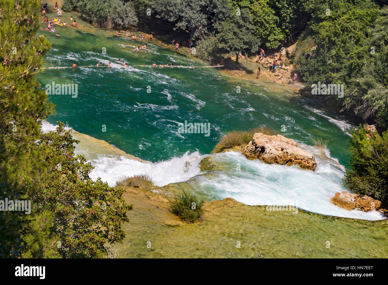 Many tourists  swim  in the Krka River in the Krka National Park in Croatia. This is one of the most famous national parks in the country, which in th Stock Photo