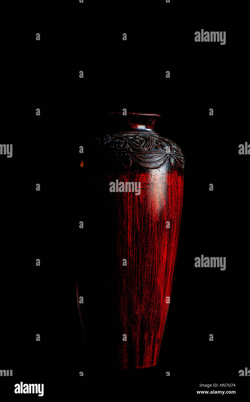 Ancient vase with a black background Stock Photo - Alamy