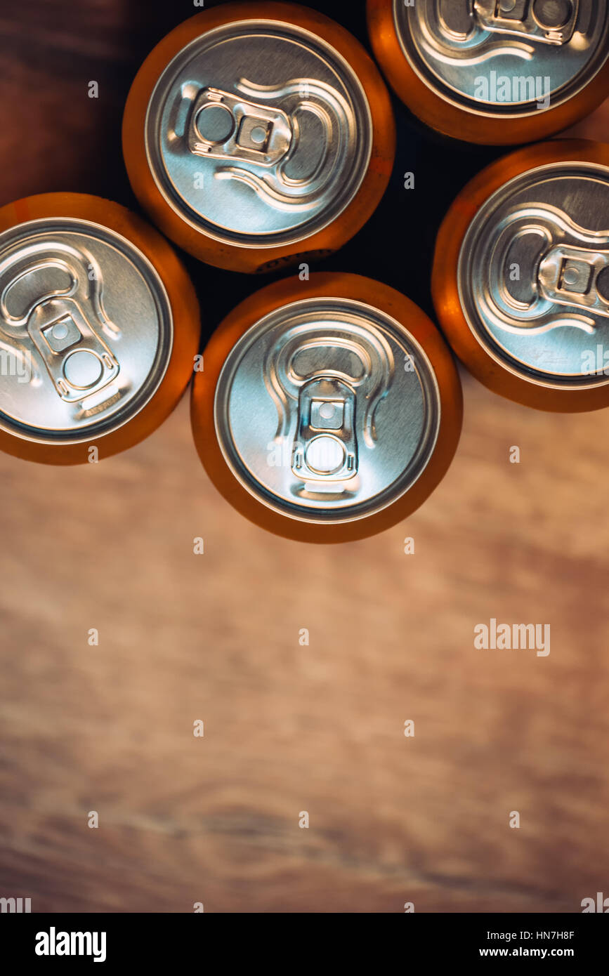 Beer cans on rustic wooden table top view with copy space Stock Photo