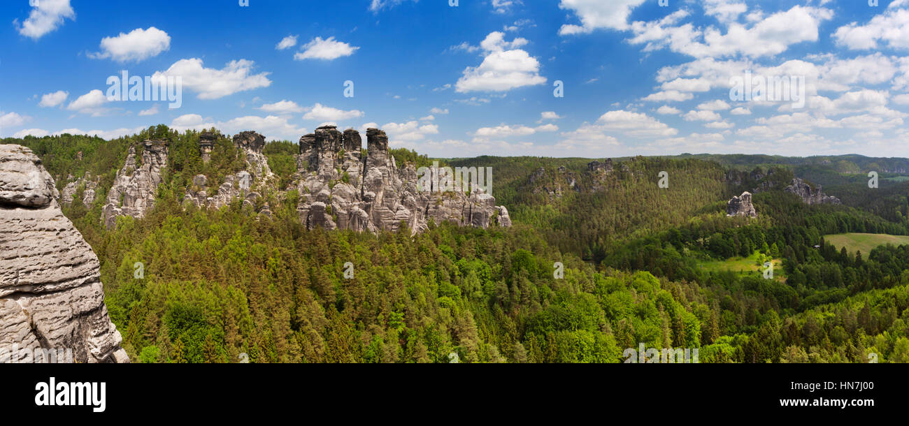 Rock formations at the Bastei in the Saxon Switzerland region in Germany. Photographed on a bright and sunny day. Stock Photo