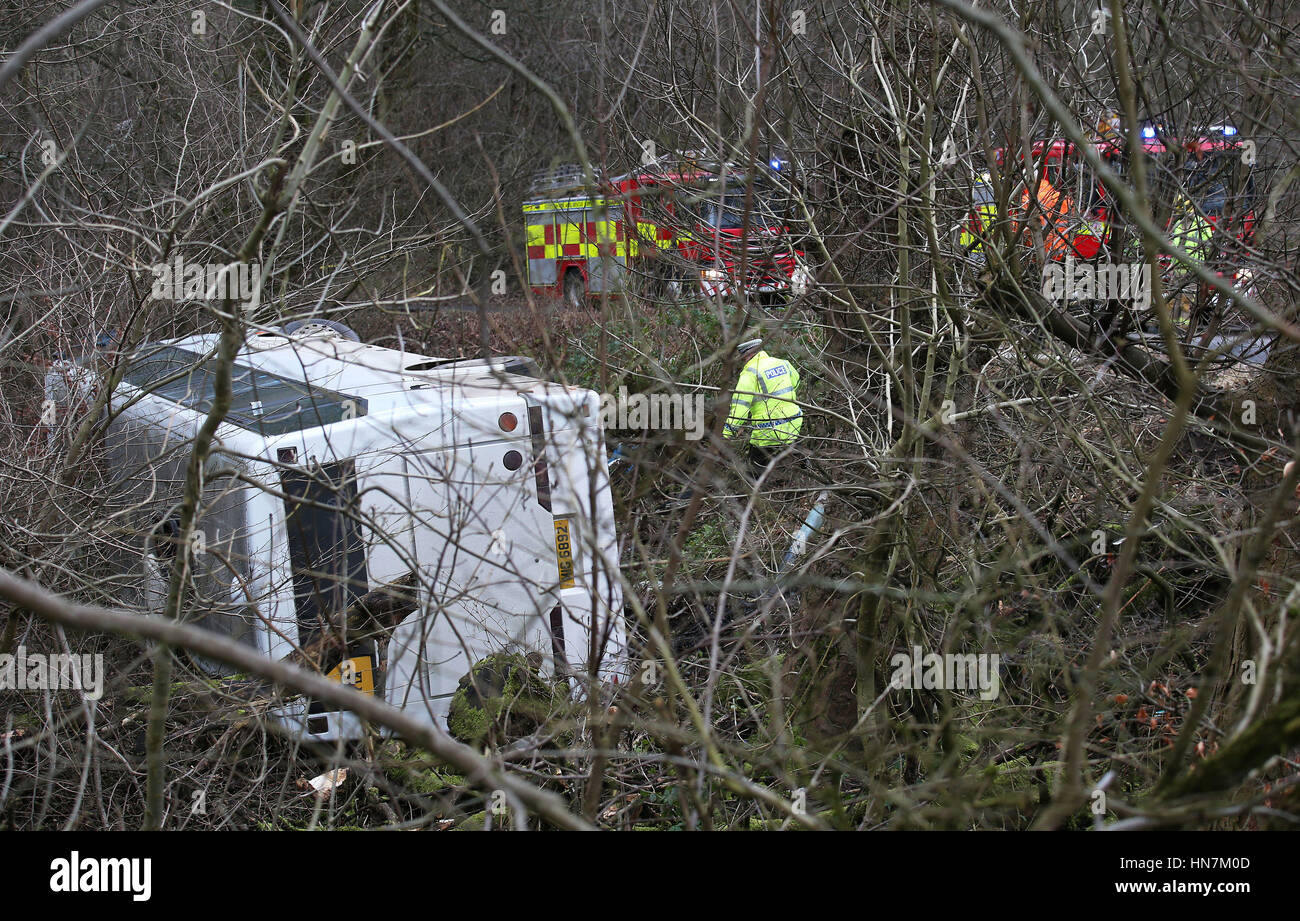 Emergency services at the scene where a school bus overturned near Our Lady's High School in Cumbernauld, Lanarkshire. Stock Photo