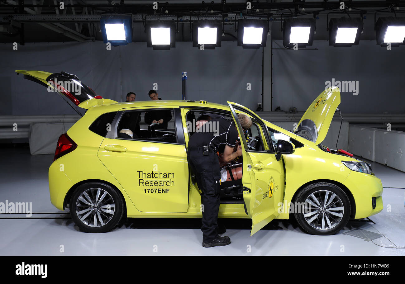 Technicians make ready a Honda Jazz before a Euro NCAP test inside the  crash test facility at Thatcham Research in Berskshire Stock Photo - Alamy