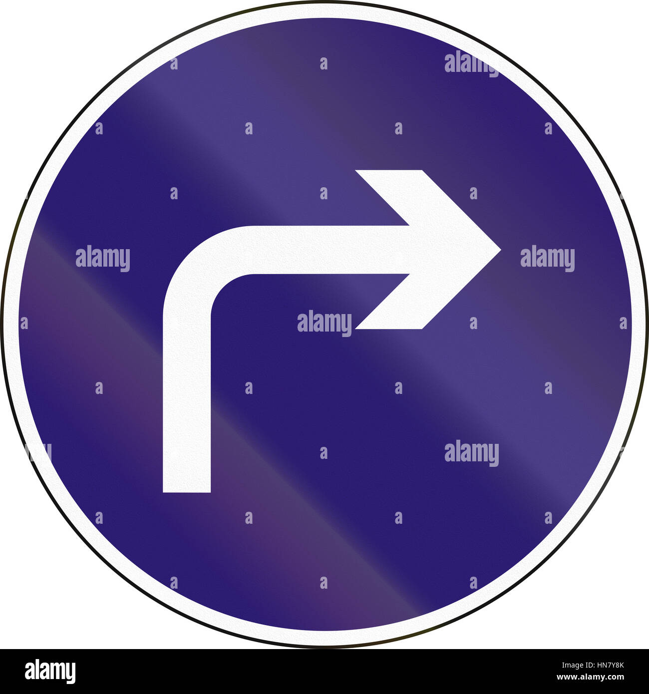 Road sign used in Hungary - Turn right ahead Stock Photo - Alamy