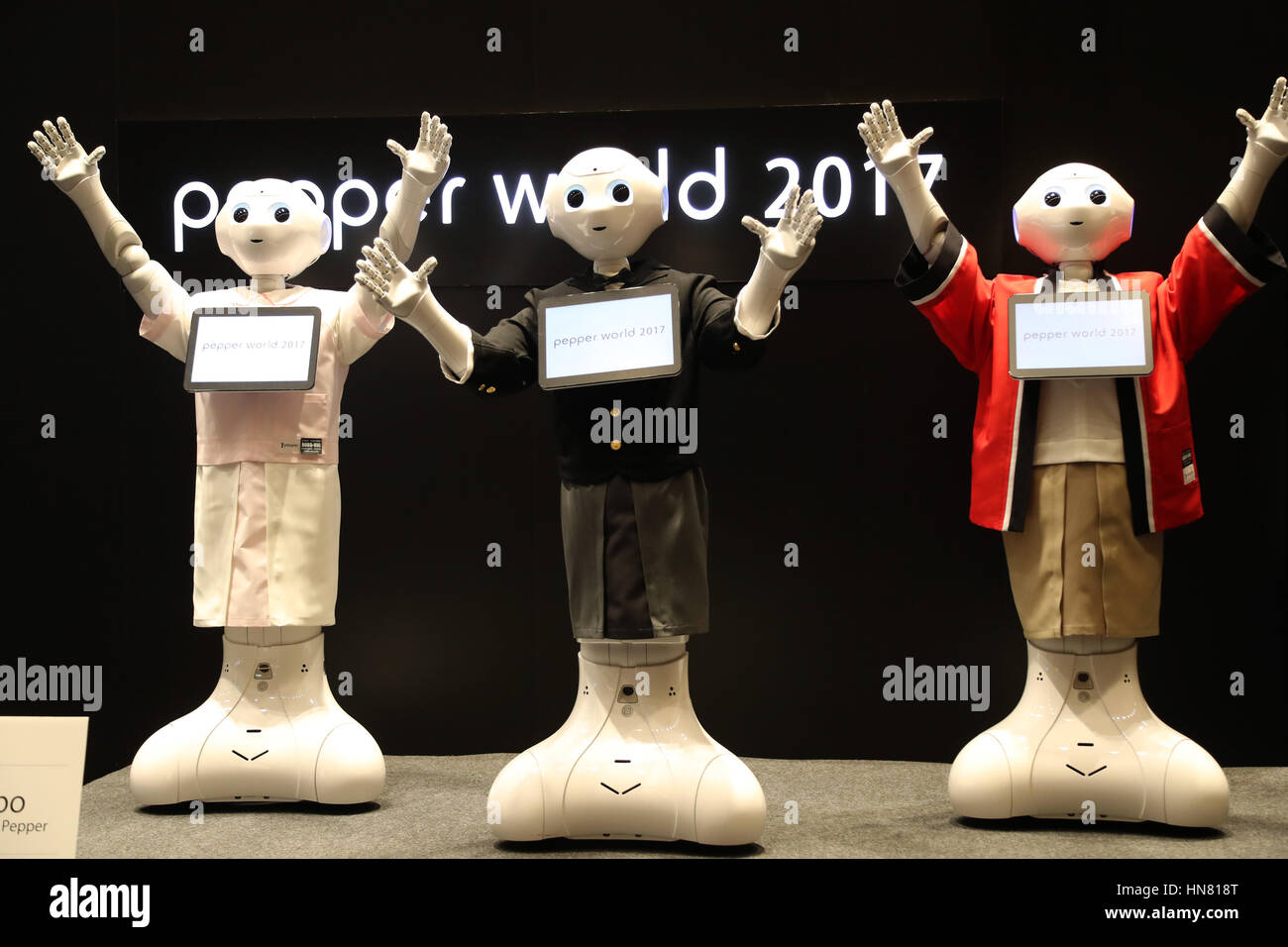 Tokyo, Japan. 9th Feb, 2017. Softbank's humanoid robot Pepper gesture to greet visitors at the Pepper World exhibition in Tokyo on Thursday, February 9, 2017. Pepper with airline staff uniform won the competition, while nurse costume won the judges' special award. Credit: Yoshio Tsunoda/AFLO/Alamy Live News Stock Photo