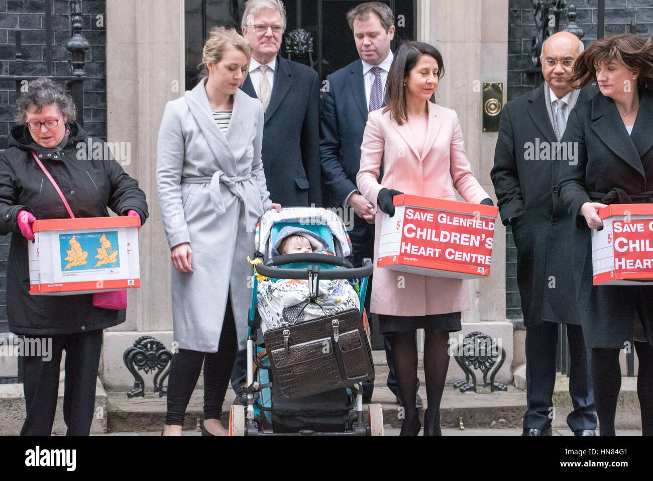 London, UK. 9th February 2017. Protesters hand a petition to 10 Downing Street against the closure of Glenfields Childrens Heart unit. MP Keith Vaz on the 2nd right of the picture and Nicky Morgan MP on the right of the picture Credit: Ian Davidson/Alamy Live News Stock Photo