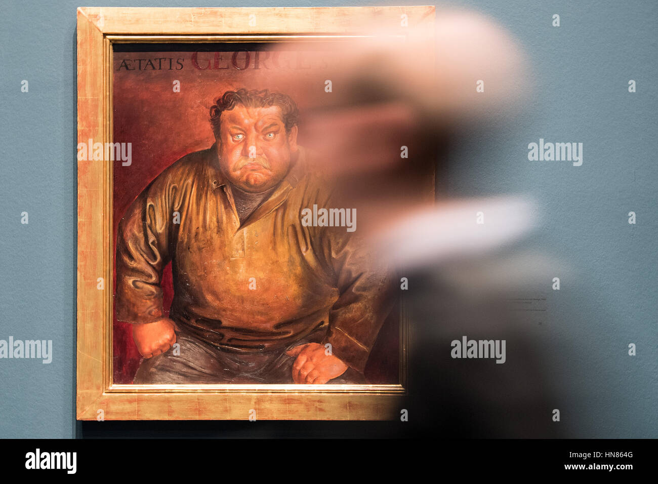 Duesseldorf, Germany. 09th Feb, 2017. A visitor looks at an artwork entitled 'Bildnis des Schauspielers Heinrich George' (lit. Portrait of the actor Heinrich George) by artist Otto Dix from 1932, in Duesseldorf, Germany, 09 February 2017. The artist's formative years in the lively art scene of the region are the focal point of a large-scale exhibition entitled 'Otto Dix. The Evil Eye, ' which will run from 11 February until 14 May 2017 at the North Rhine-Westphalian Art Collection. Photo: Federico Gambarini/dpa/Alamy Live News Stock Photo