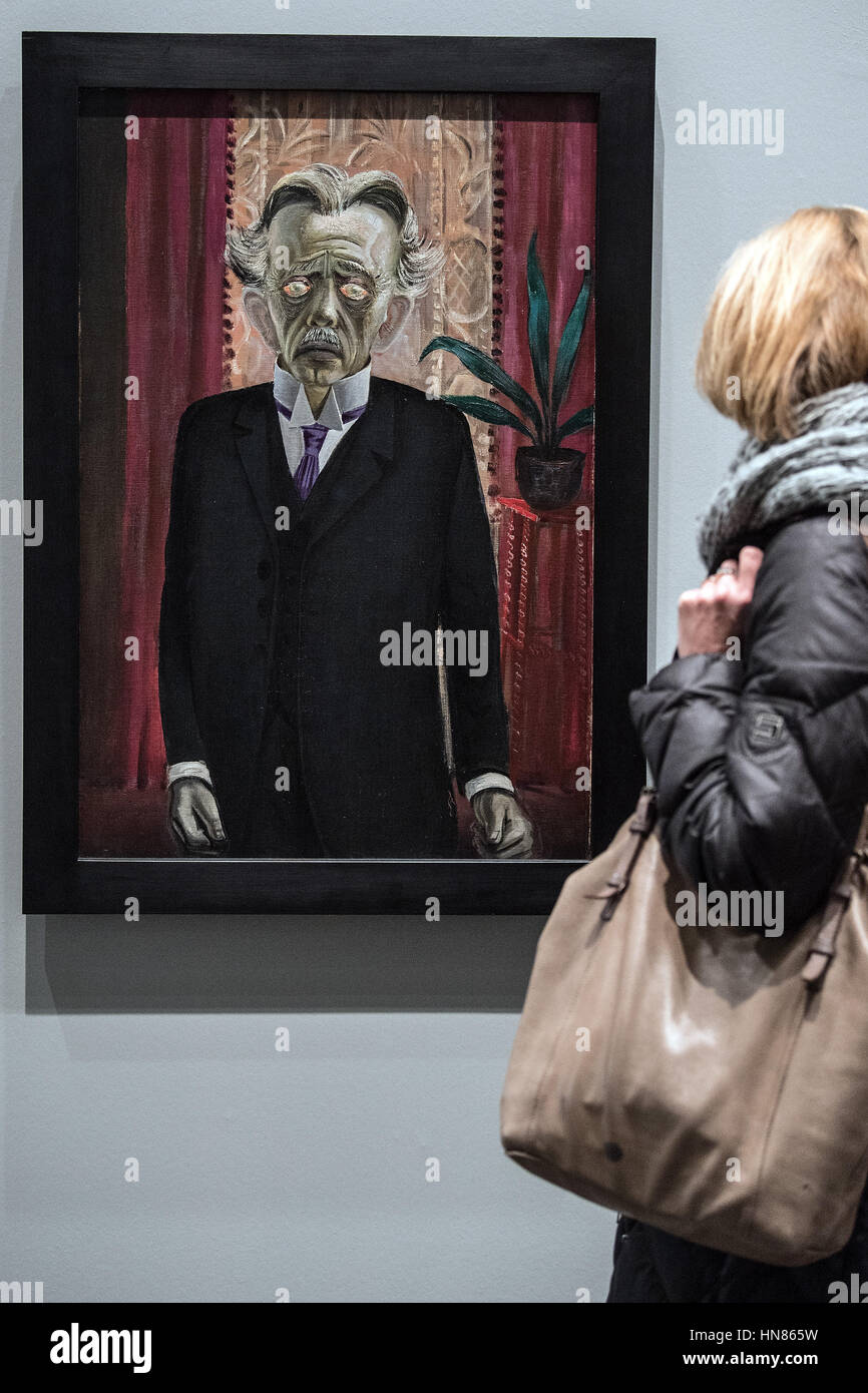 Duesseldorf, Germany. 09th Feb, 2017. A visitor looks at an artwork entitled 'Bildnis des Dr. Heinrich Stadelmann' (lit. Portrait of Dr. Heinrich Stadelmann) by artist Otto Dix from 1922, in Duesseldorf, Germany, 09 February 2017. The artist's formative years in the lively art scene of the region are the focal point of a large-scale exhibition entitled 'Otto Dix. The Evil Eye, ' which will run from 11 February until 14 May 2017 at the North Rhine-Westphalian Art Collection. Photo: Federico Gambarini/dpa/Alamy Live News Stock Photo