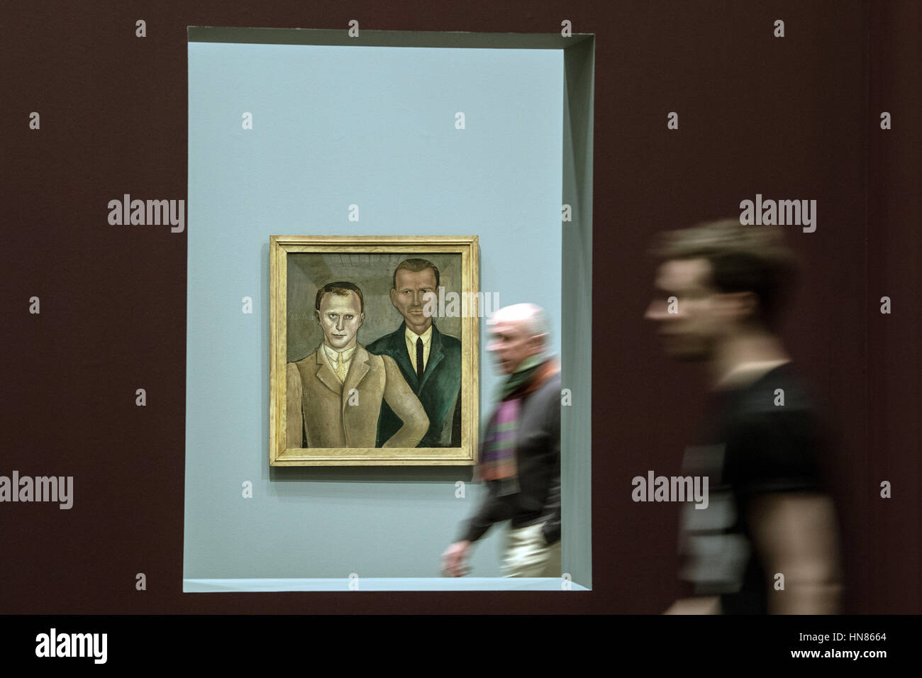 Duesseldorf, Germany. 09th Feb, 2017. Visitors walk past an artwork entitled 'Otto Dix/Kurt Guenther, Doppelbildnis' (lit. Otto Dix/Kurt Guenther, double portrait) by artist Otto Dix from 1920, in Duesseldorf, Germany, 09 February 2017. The artist's formative years in the lively art scene of the region are the focal point of a large-scale exhibition entitled 'Otto Dix. The Evil Eye, ' which will run from 11 February until 14 May 2017 at the North Rhine-Westphalian Art Collection. Photo: Federico Gambarini/dpa/Alamy Live News Stock Photo