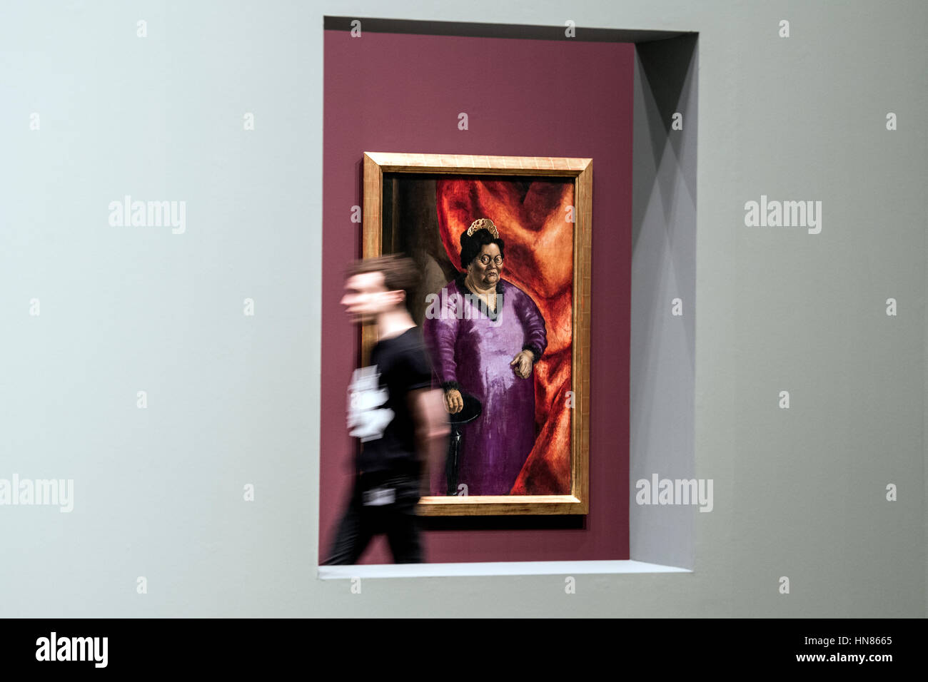 Duesseldorf, Germany. 09th Feb, 2017. A visitor walks past an artwork entitled 'Bildnis der Kunsthaendlerin Johanna Ey' (lit. Portrait of art dealer Johanna Ey) by artist Otto Dix from 1924, in Duesseldorf, Germany, 09 February 2017. The artist's formative years in the lively art scene of the region are the focal point of a large-scale exhibition entitled 'Otto Dix. The Evil Eye, ' which will run from 11 February until 14 May 2017 at the North Rhine-Westphalian Art Collection. Photo: Federico Gambarini/dpa/Alamy Live News Stock Photo