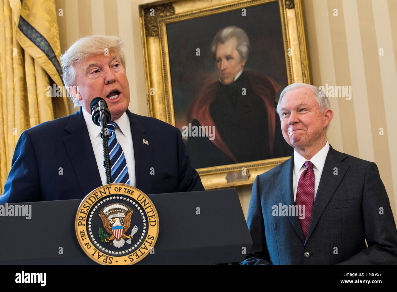 Attorney General Jeff Sessions (R) listens to U.S. President Donald J. Trump (L) speak before Vice President Mike Pence swore Sessions in as the next attorney general in the Oval Office of the White House in Washington, DC, USA, 09 February 2017. On 08 February, after a contentious battle on party lines, the Senate voted to confirm Sessions as attorney general. Credit: Jim LoScalzo/Pool via CNP /MediaPunch Stock Photo