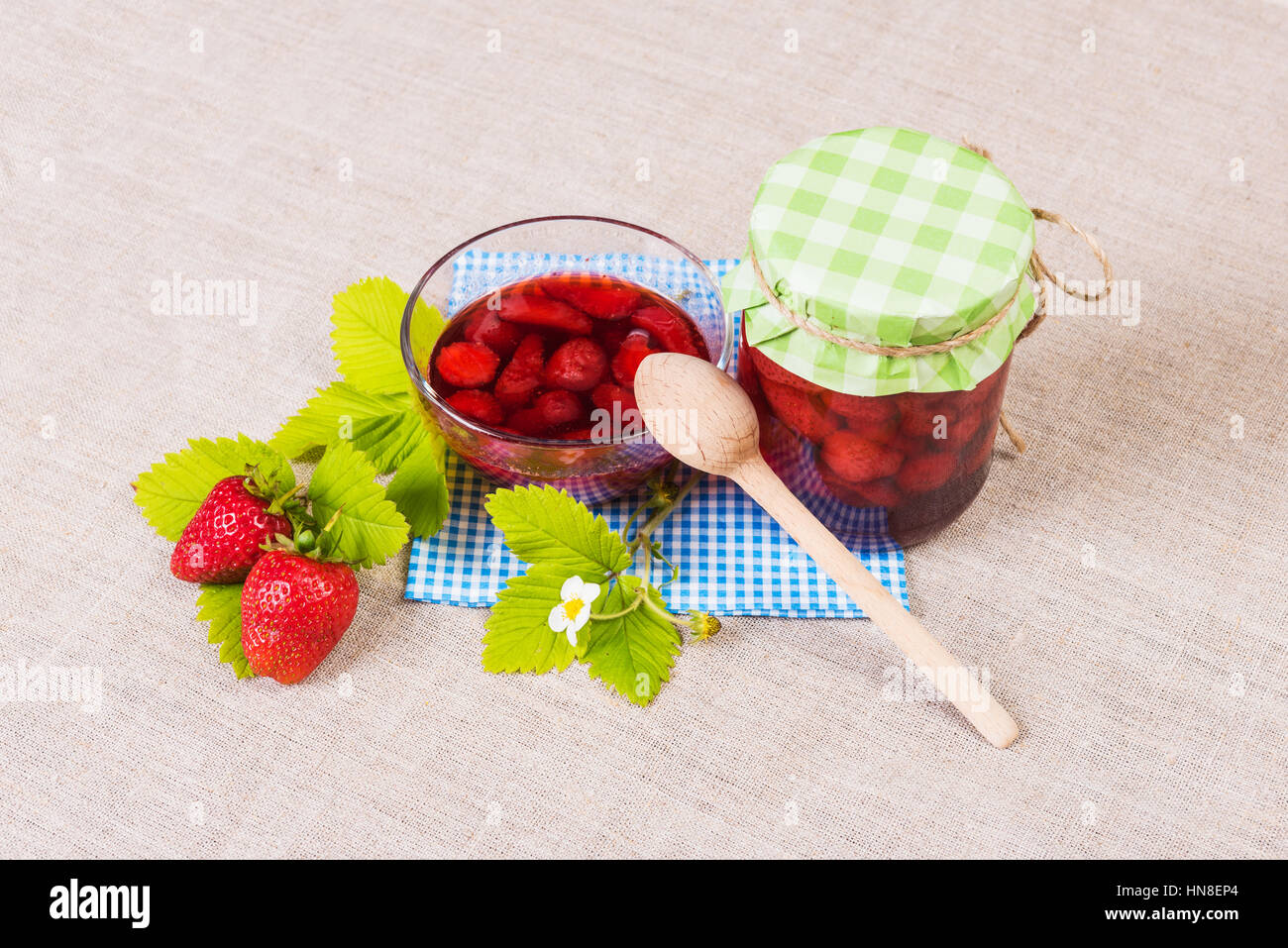 summer fresh red strawberry and jam on textile background Stock Photo ...