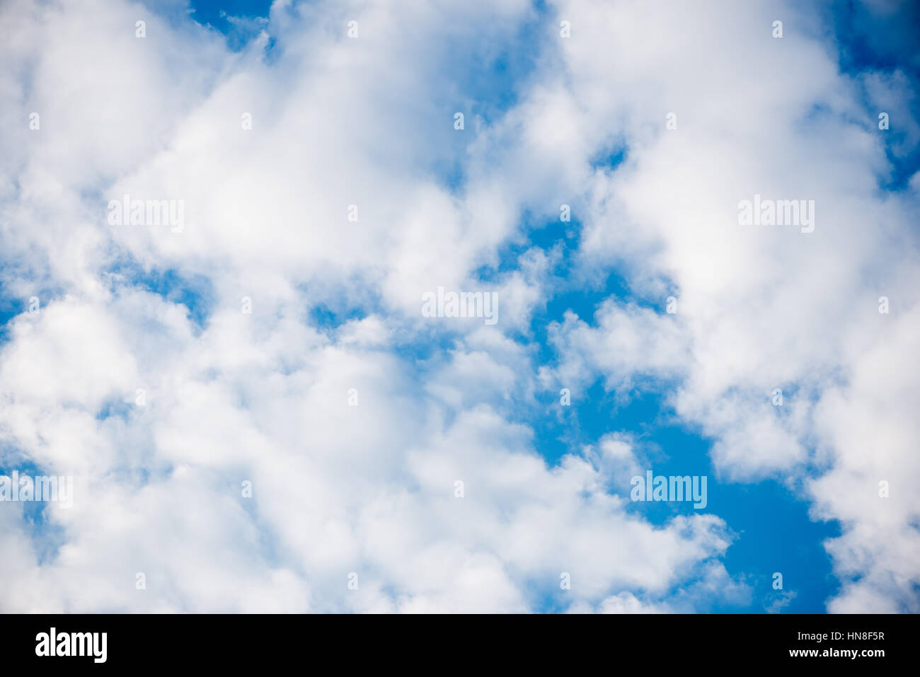 White clouds moving over blue hi-res stock photography and images - Alamy