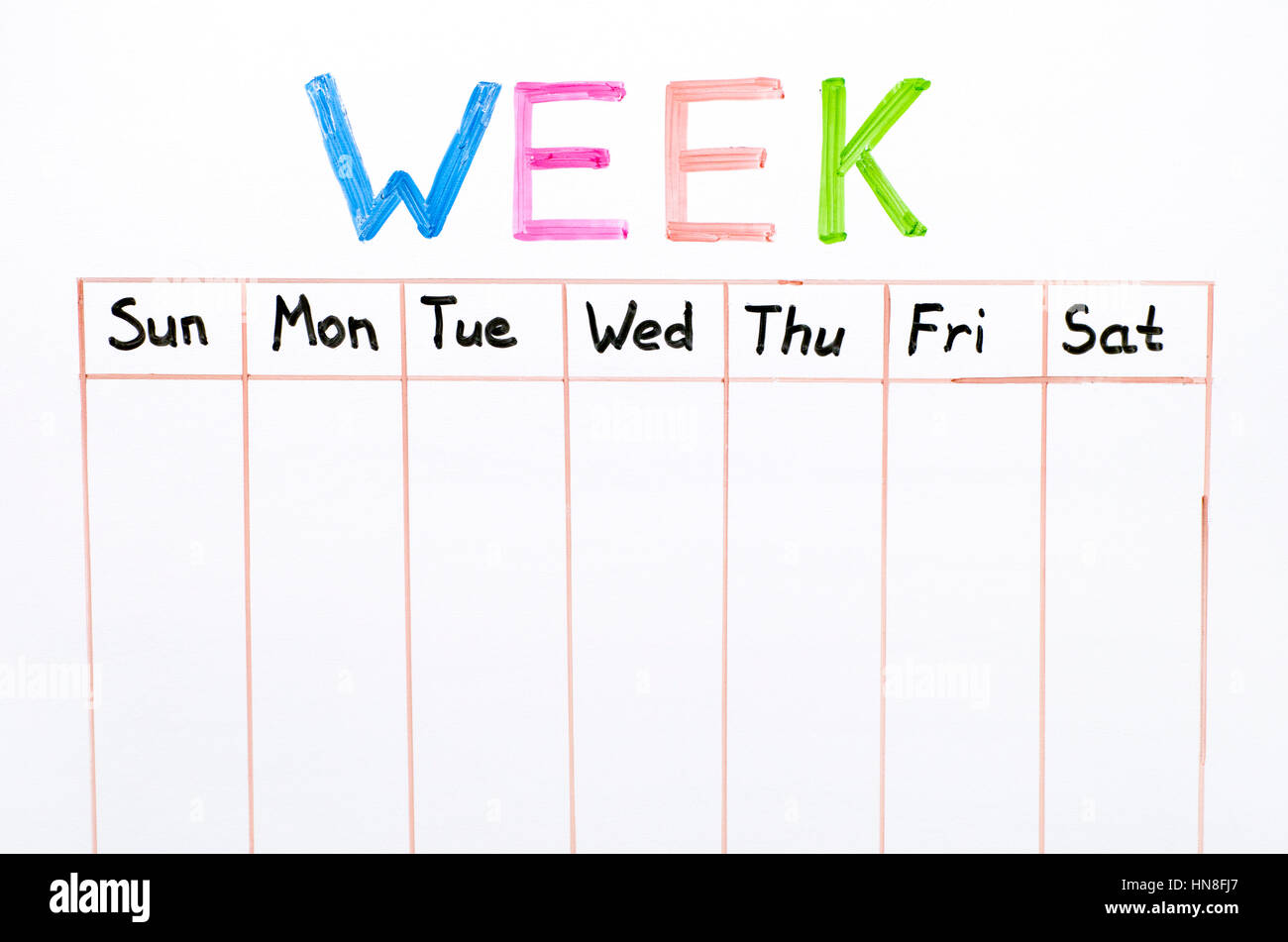 Seven days of the week writing on whiteboard. Close-up Stock Photo - Alamy