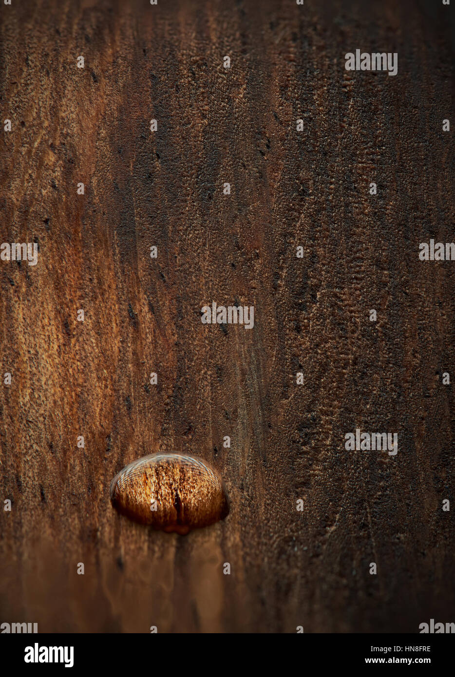 close up of brown wood surface with water drop Stock Photo