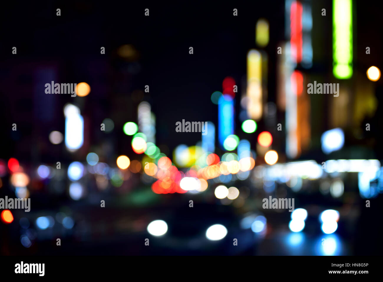 abstract out of focus of evening traffic. Stock Photo