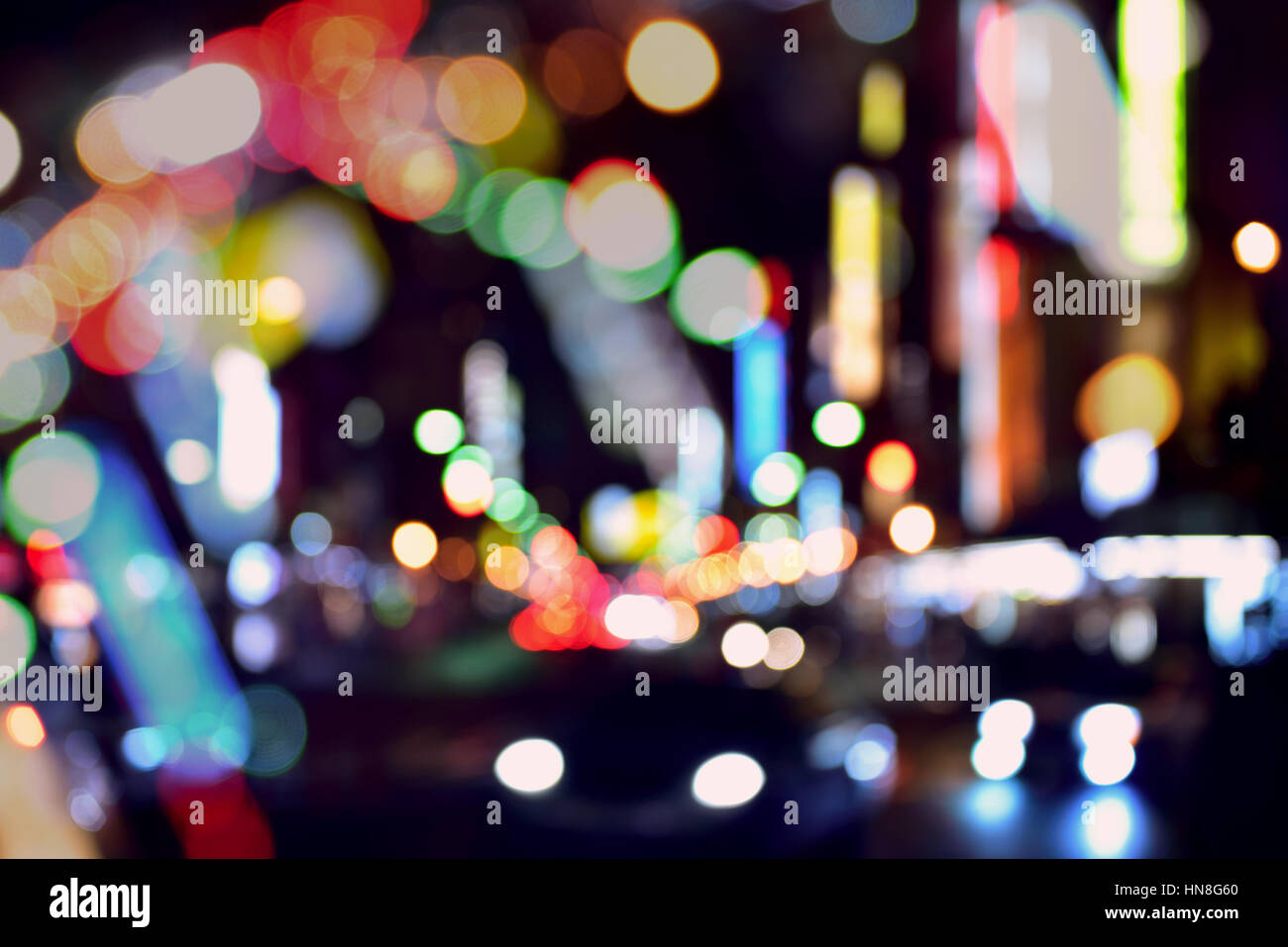 abstract out of focus of evening traffic. Stock Photo