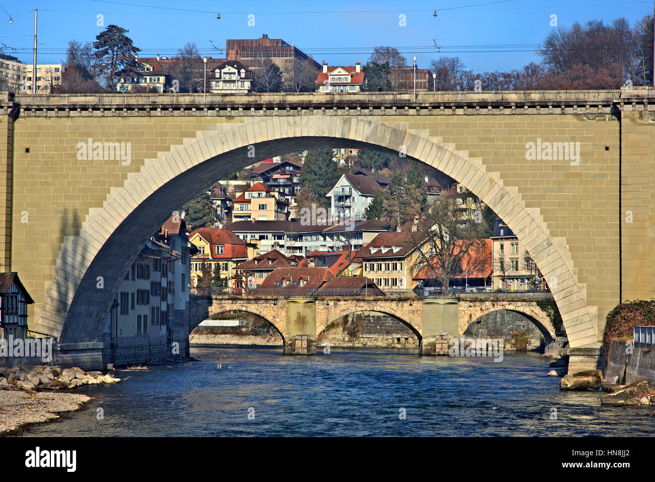 Bridges over river Aare (the Nydeggbrücke front, the Untertorbrücke back), Bern city, Switzerland. Stock Photo