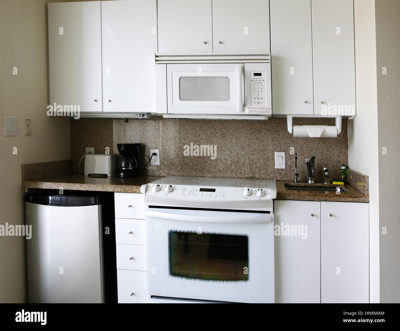 Compact kitchenette in hotel suite Stock Photo - Alamy
