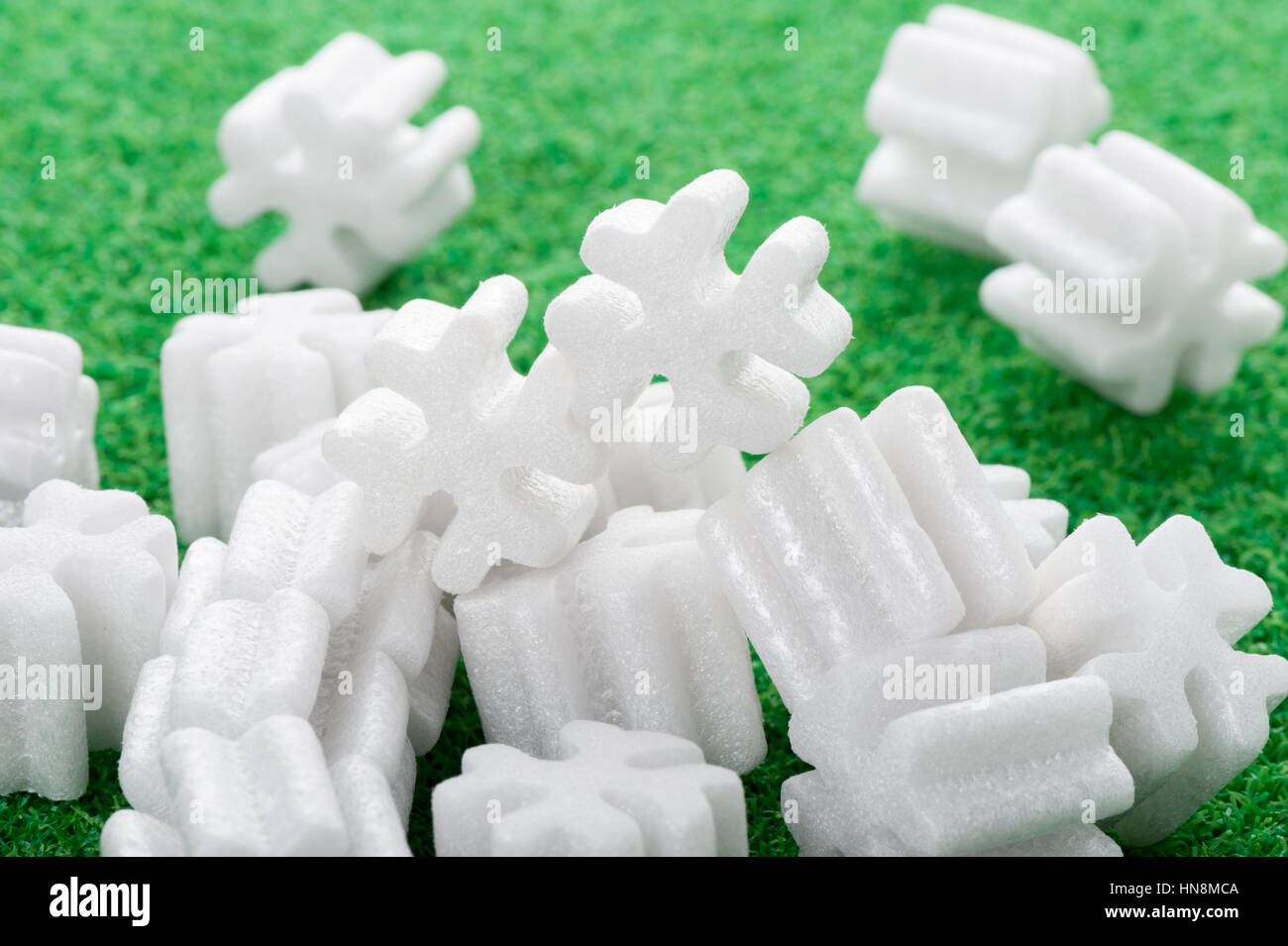 fill packing foam pellets on green background Stock Photo Alamy
