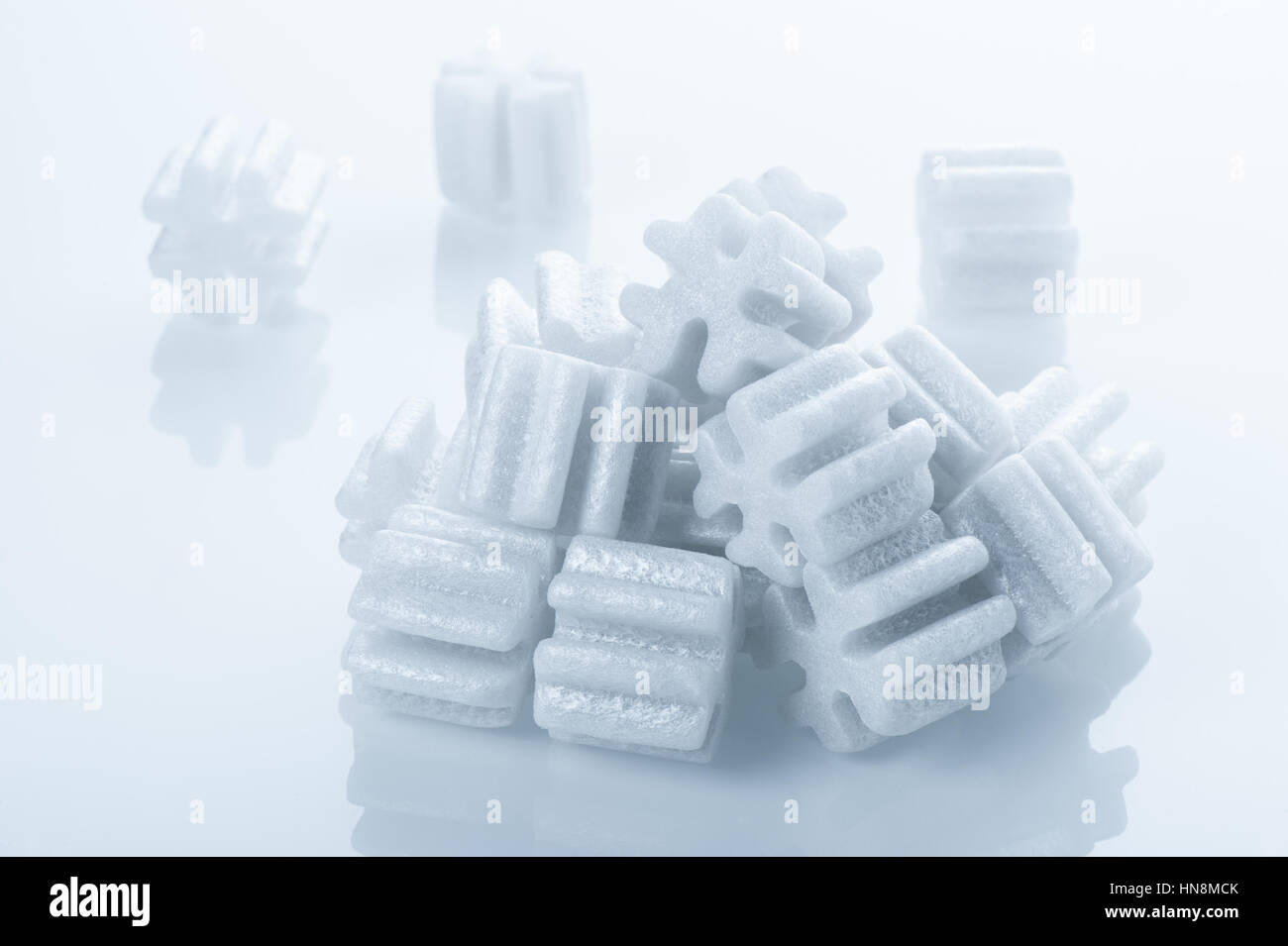 fill packing foam pellets on white background Stock Photo - Alamy