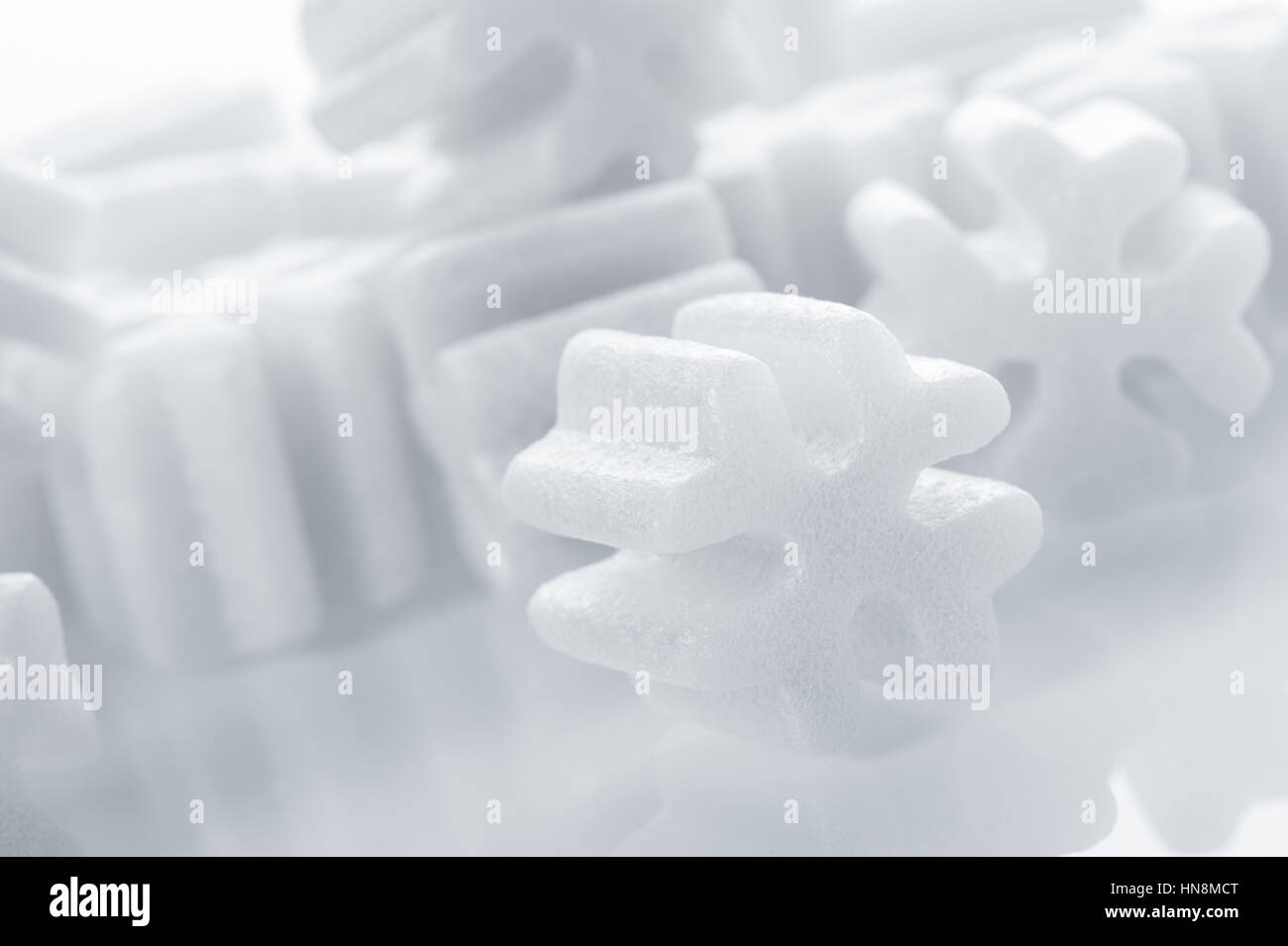 fill packing foam pellets on white background Stock Photo - Alamy