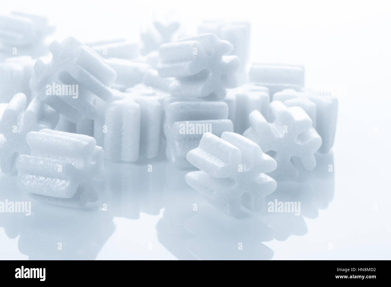 fill packing foam pellets on white background Stock Photo - Alamy