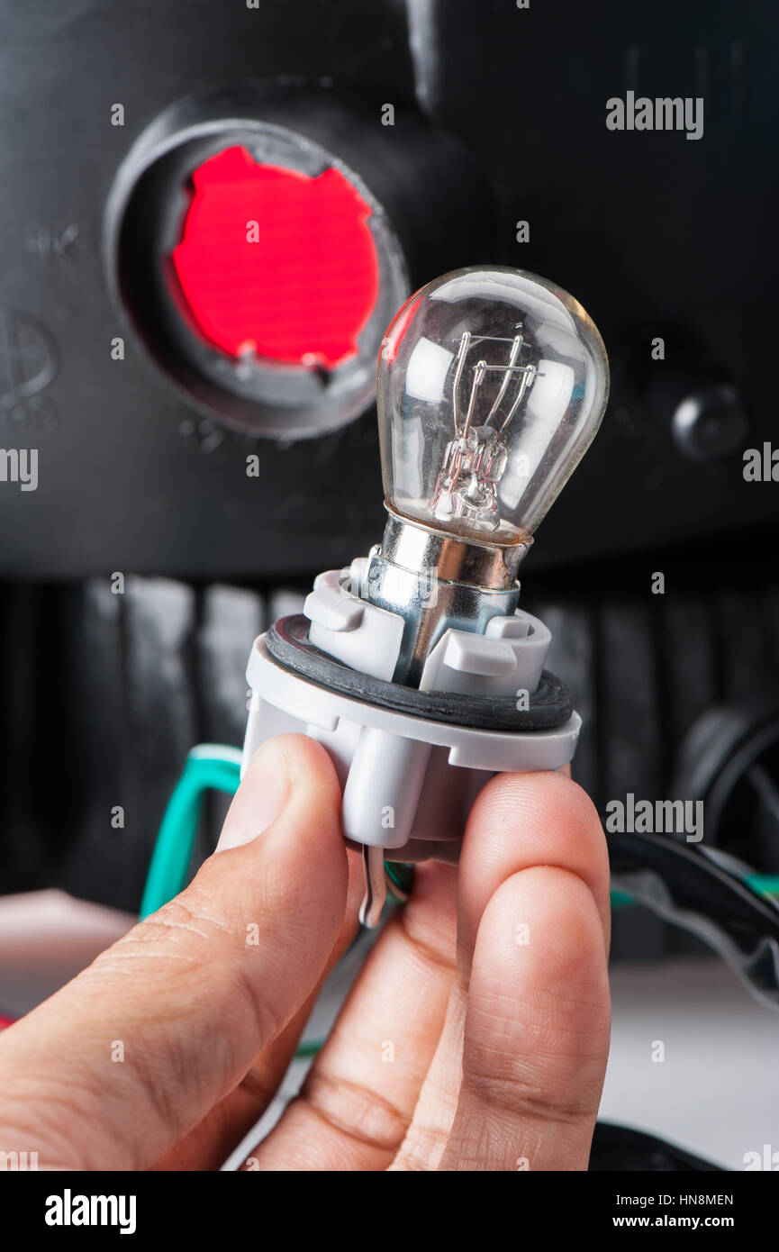 automotive light bulb connected to light socket Stock Photo Alamy