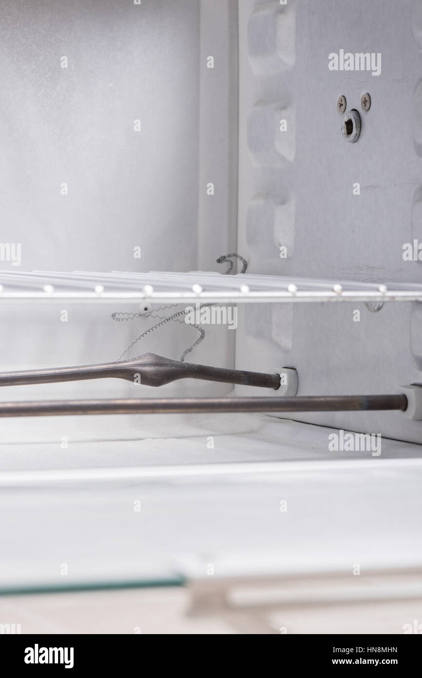 damage in the oven after explosion of heating element Stock Photo Alamy