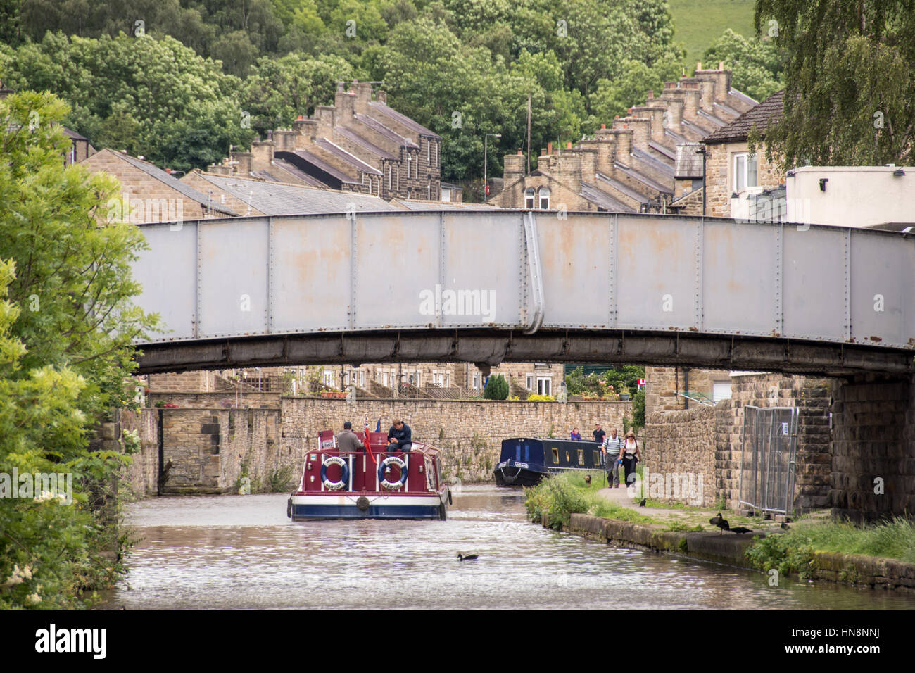 England, Yorkshire, Skipton - Riverboats in a canal that flows through the town of Skipton, a market town and civil parish in the Craven district of N Stock Photo
