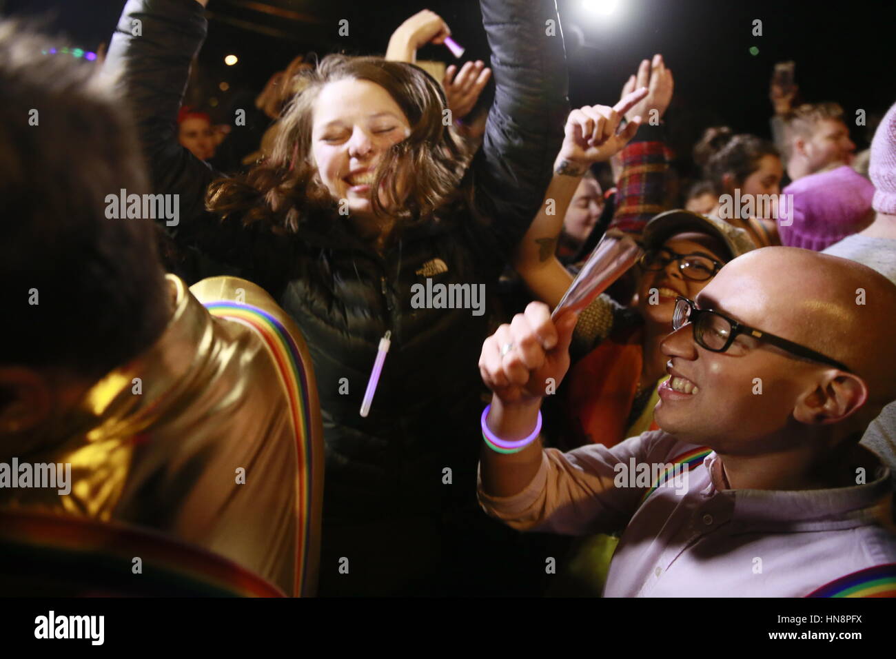 Members of the LGBTQ commuity and allies march to United States Vice