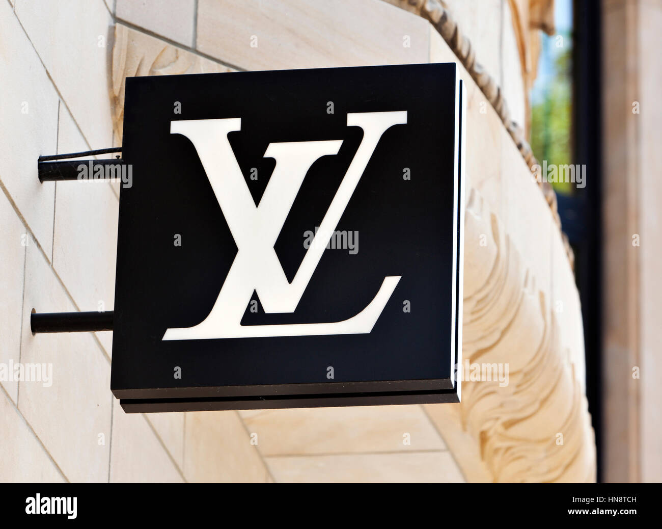 Dusseldorf, Germany - August 20, 2011: Louis Vuitton logo at the store on Königsallee. Louis Vuitton Malletier is a french fashion house and well-know Stock Photo