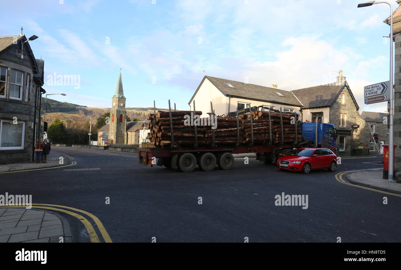Logging truck passing through Aberfeldy Scotland  February 2017 Stock Photo