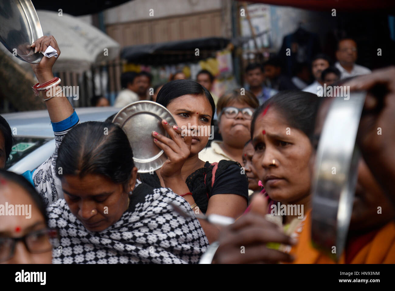 Kolkata, India. 09th Feb, 2017. Women beat dishes with spoon during the ...