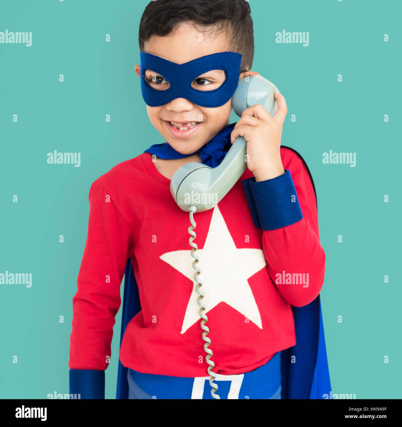 Superhero Boy with Telephone Concept Stock Photo - Alamy