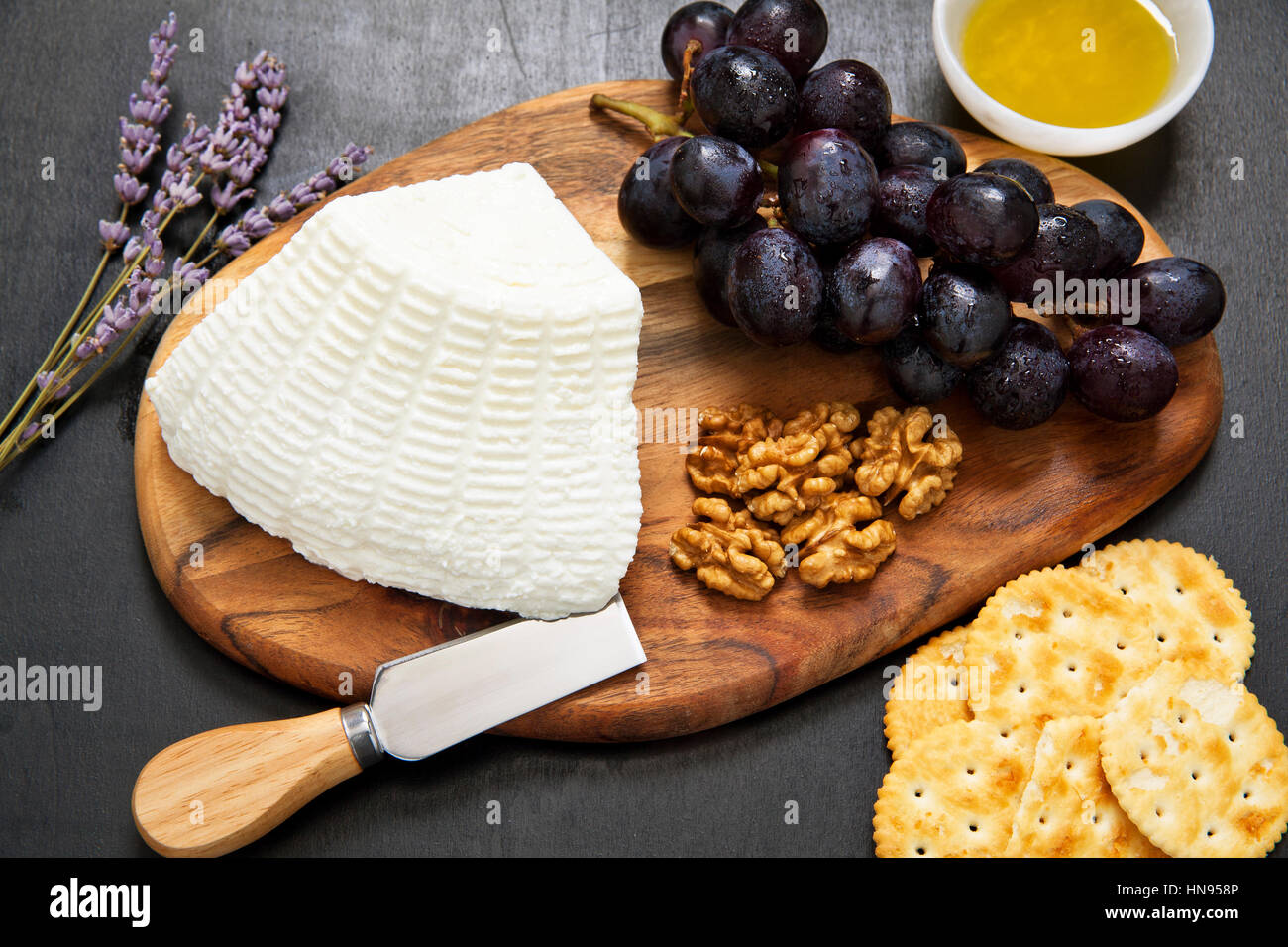 appetizer with ricotta. lavender, grapes, walnuts, olive oil and