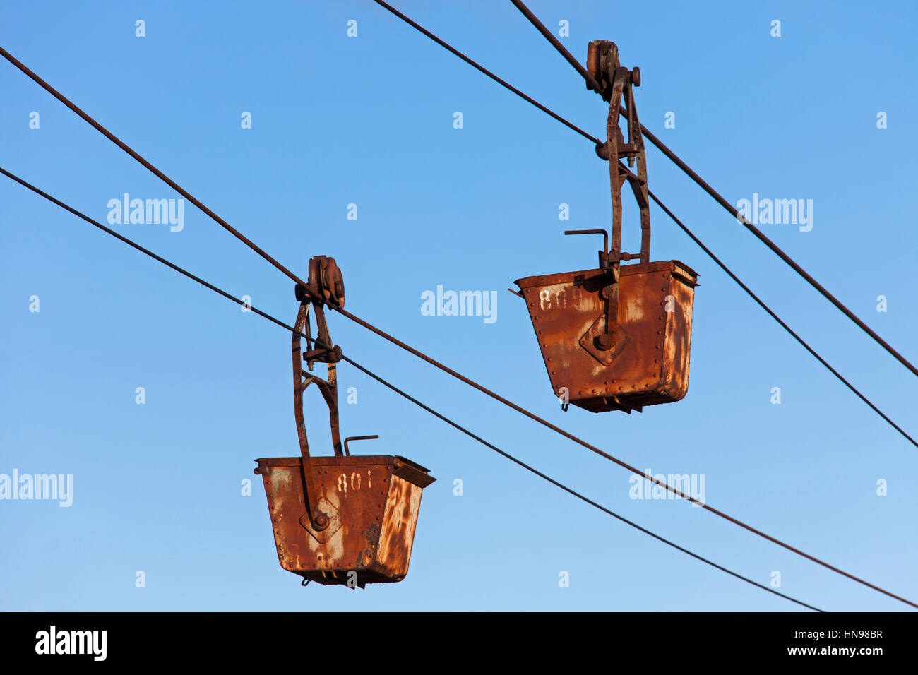 Buckets on the aerial tramway leading from the old coal mine at Longyearbyen, Svalbard, Norway Stock Photo