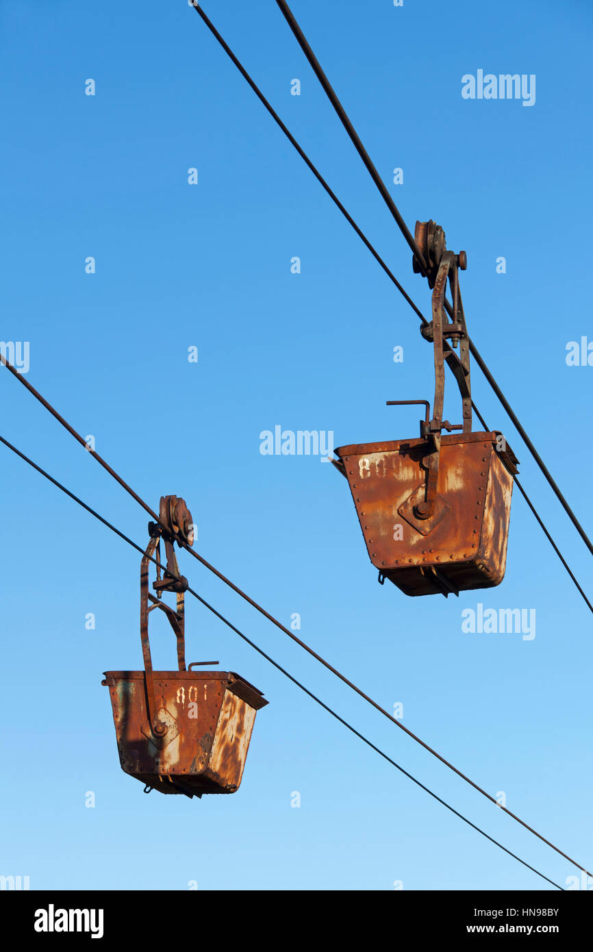 Buckets on the aerial tramway leading from the old coal mine at Longyearbyen, Svalbard, Norway Stock Photo