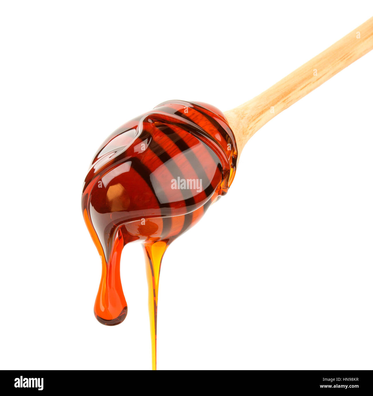 Honey stick isolated on white Stock Photo