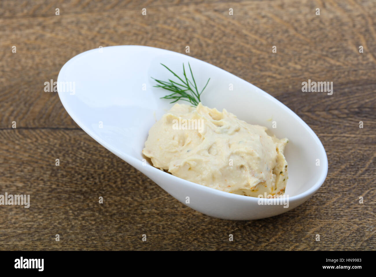 Arabic traditional cusine hummus with dill and cedar nuts Stock Photo