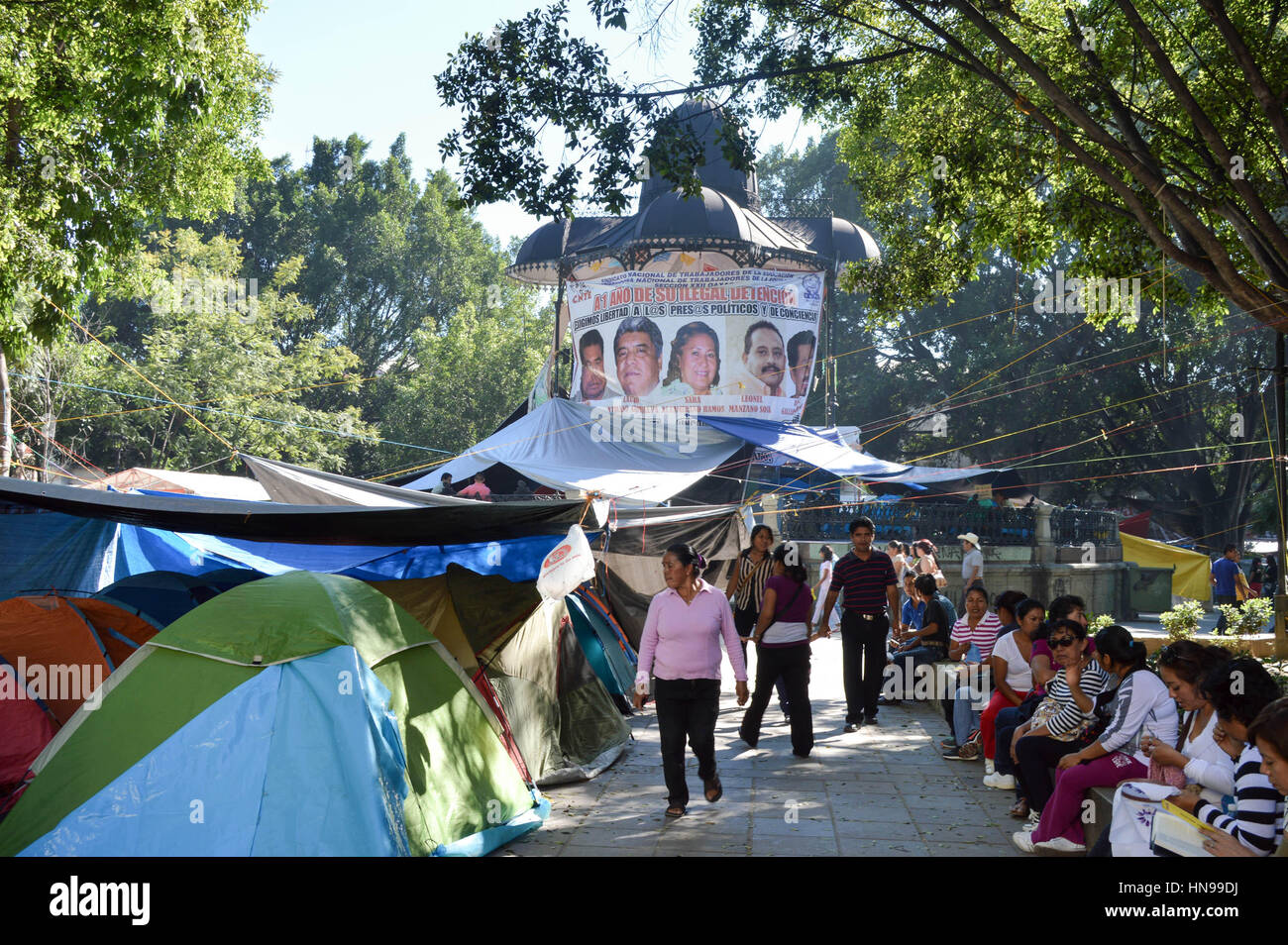 Oaxaca, Mexico - November 16, 2014: Teachers protest on Zocalo square in the city of Oaxaca, tents are seen everywhere, in Oaxaca, Mexico. Stock Photo