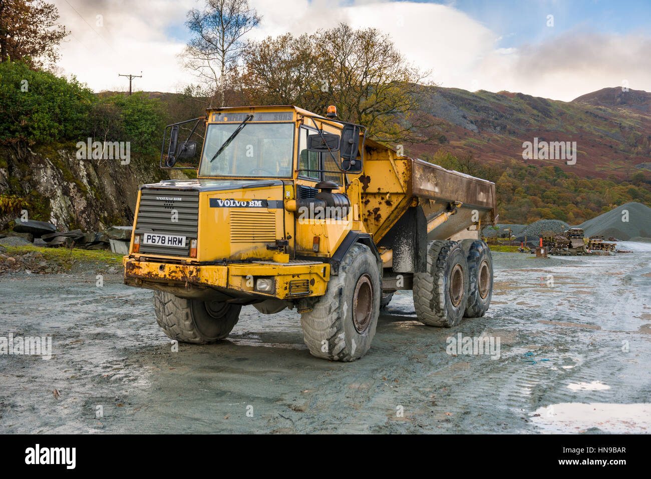 A Volvo BM A25C 6x6 articulated hauler at Elterwater Quarry, Cumbria, England. Stock Photo