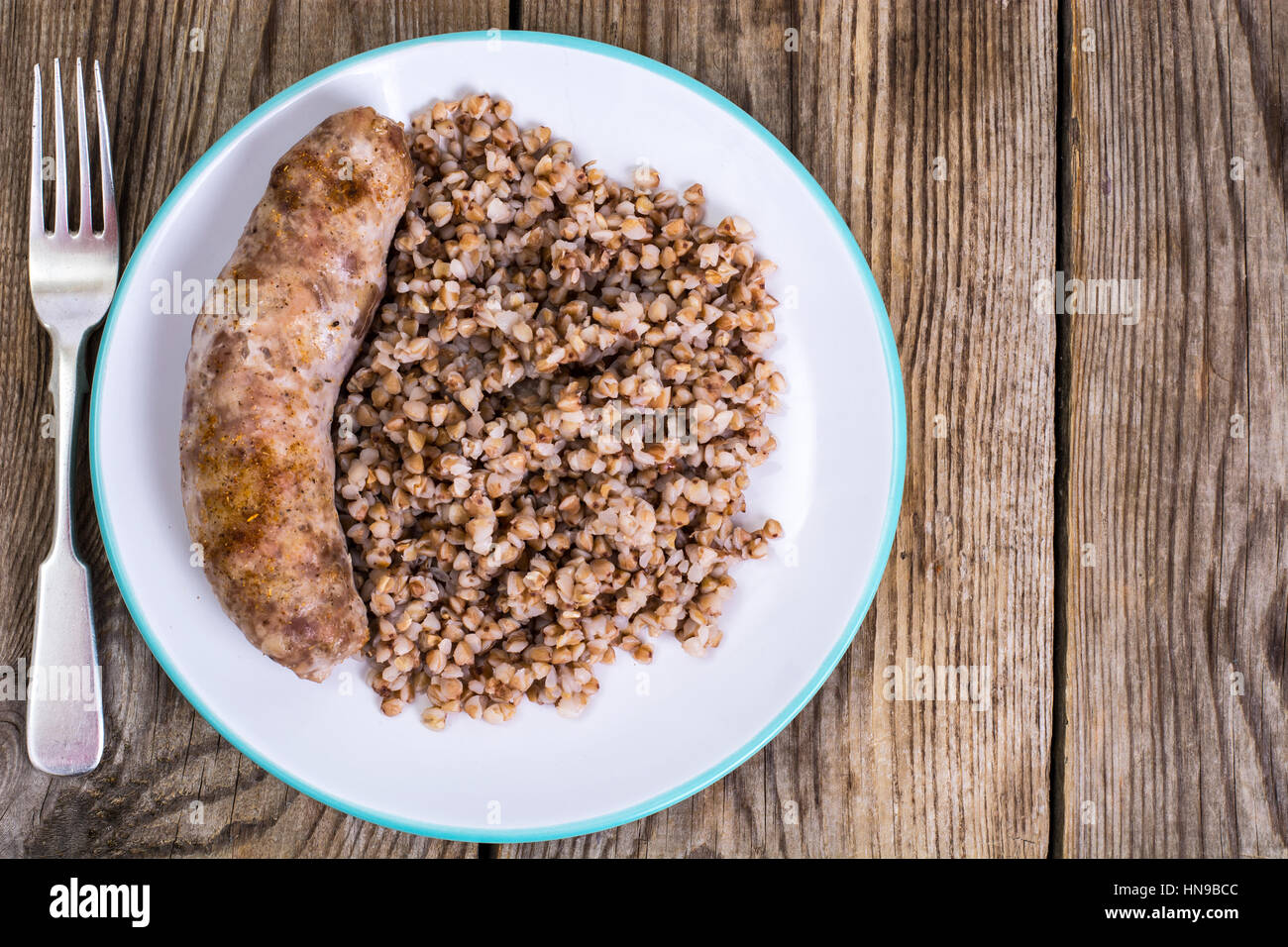 Fried sausage with buckwheat Stock Photo Alamy