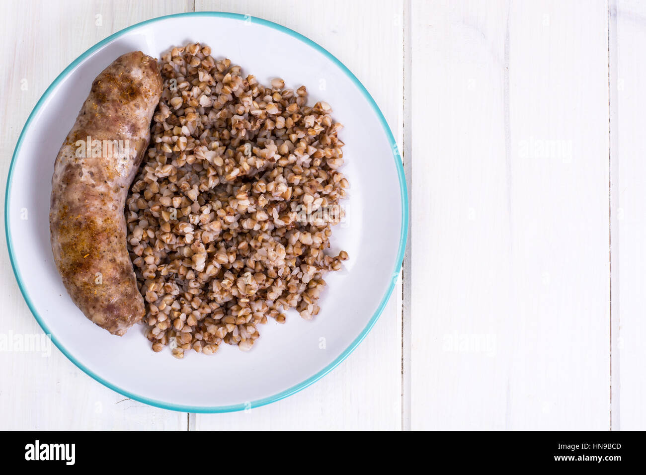 Fried sausage with buckwheat Stock Photo Alamy