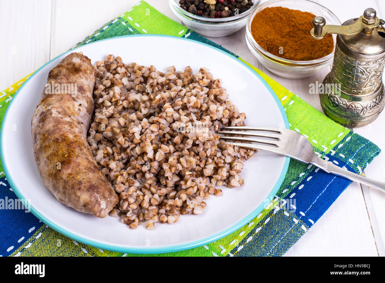 Fried sausage with buckwheat Stock Photo Alamy