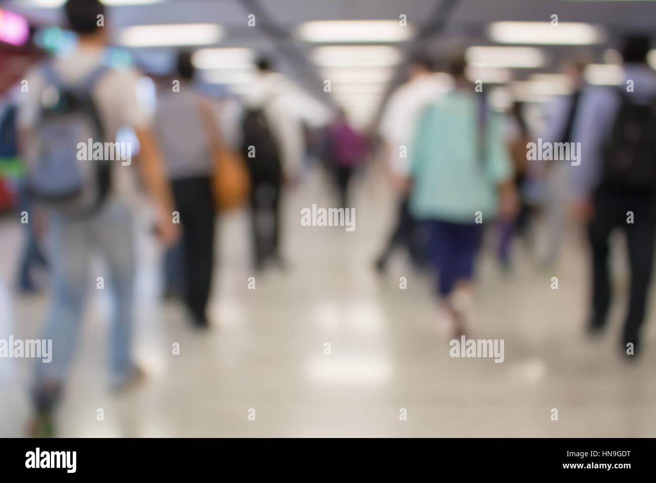 Blurred defocused abstract background of people walking Stock Photo - Alamy