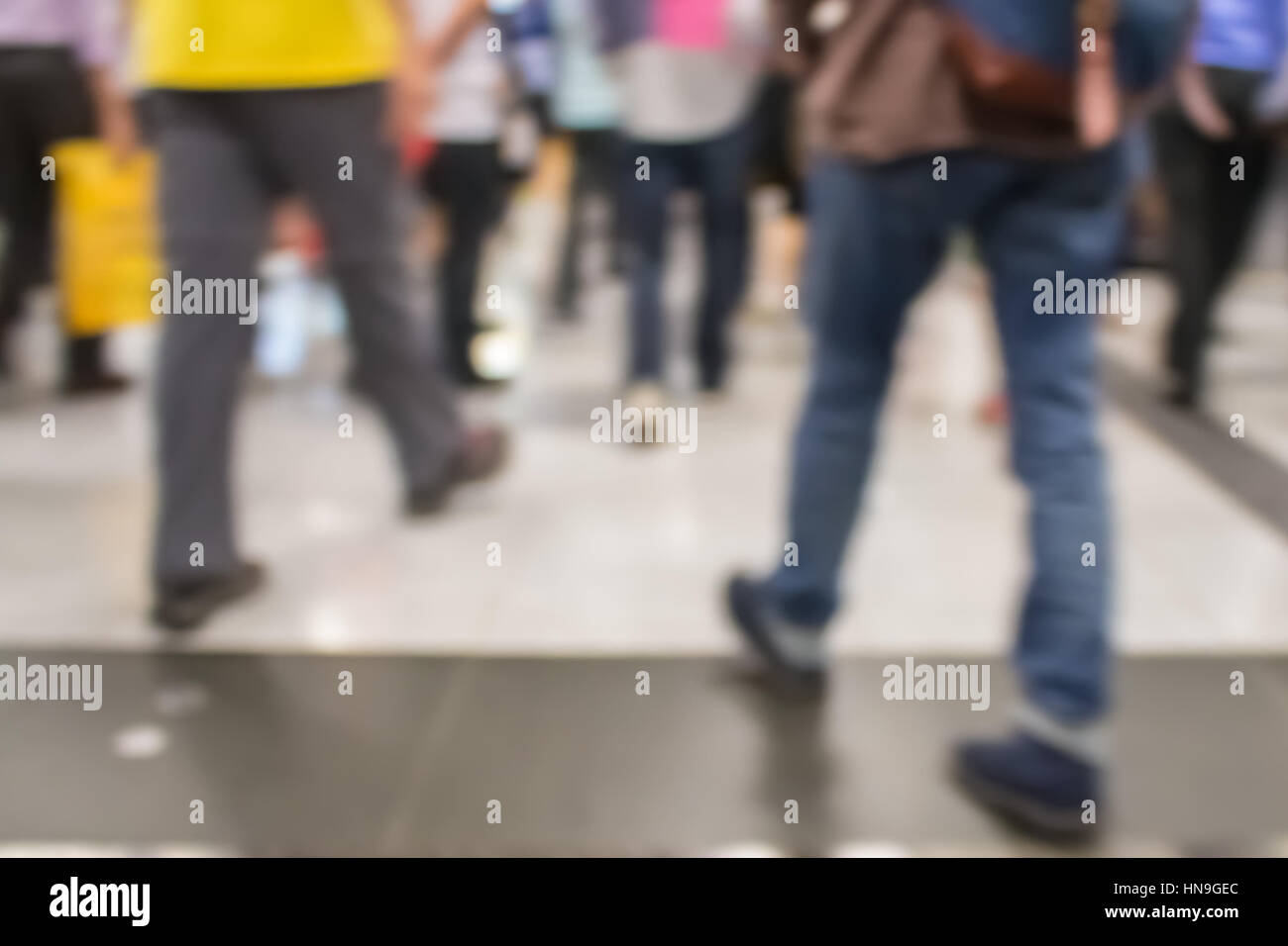 Blurred defocused abstract background of people walking Stock Photo - Alamy