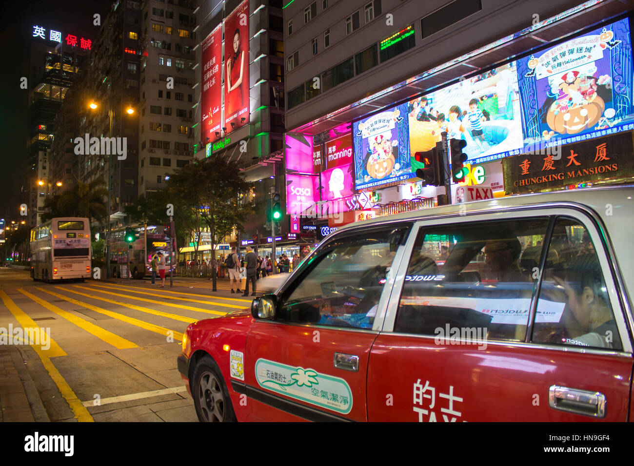 Street Scene at night in Hong Kong Stock Photo - Alamy