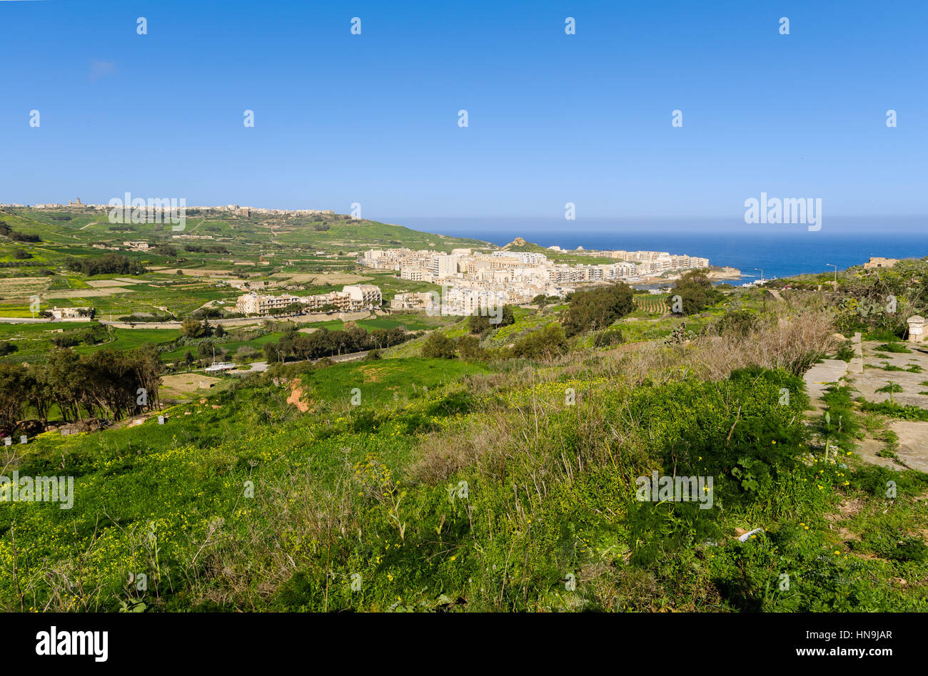 Views over Marsalforn and the Gozitan countryside - Malta Stock Photo