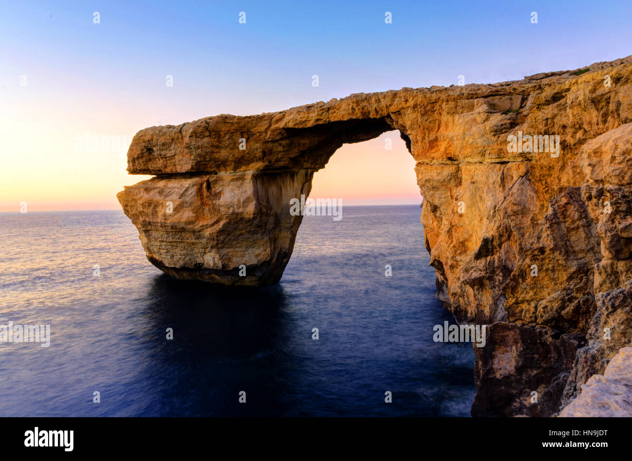 Sunset over the Azure Window in Dwejra – Gozo Stock Photo - Alamy